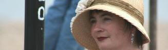 A straw cloche hat on Crag Path in Aldeburgh
