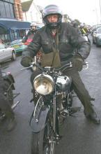 Andy Tiernan on a bike beautifully restored by David