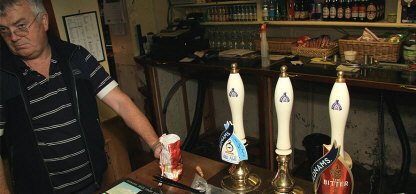 Landlord Neil Pascoe at the bar