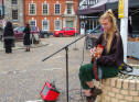 Chloe Lawrence busking on the Market Hill Framlingham