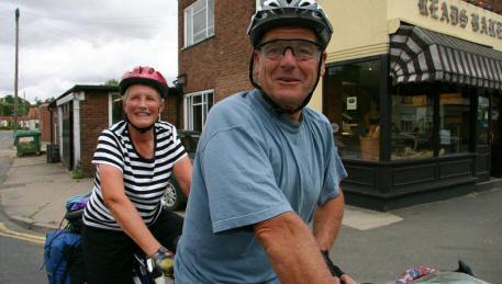 August, and Vic and Mary arrive back rather browner