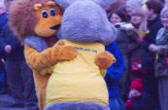 Mascots embracing in Halesworth