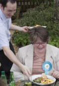 Therese Coffey with panini and chips