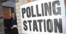 First voter waiting for the poll to open