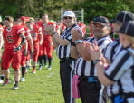 Referees applauding the Cambridge Cats and Bury Saints